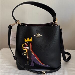 NWT Coach x Basquiat “Pez Dispenser” Dinosaur crossbody bag **Firm Price**